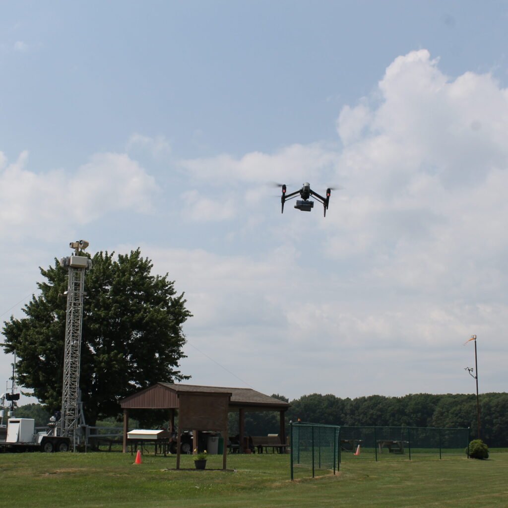 Drone flying in air.